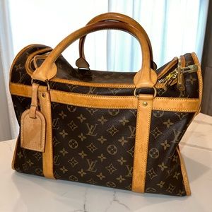 Louis Vuitton Doggy Carrier for small dog (pet) it’s beautiful and works great.